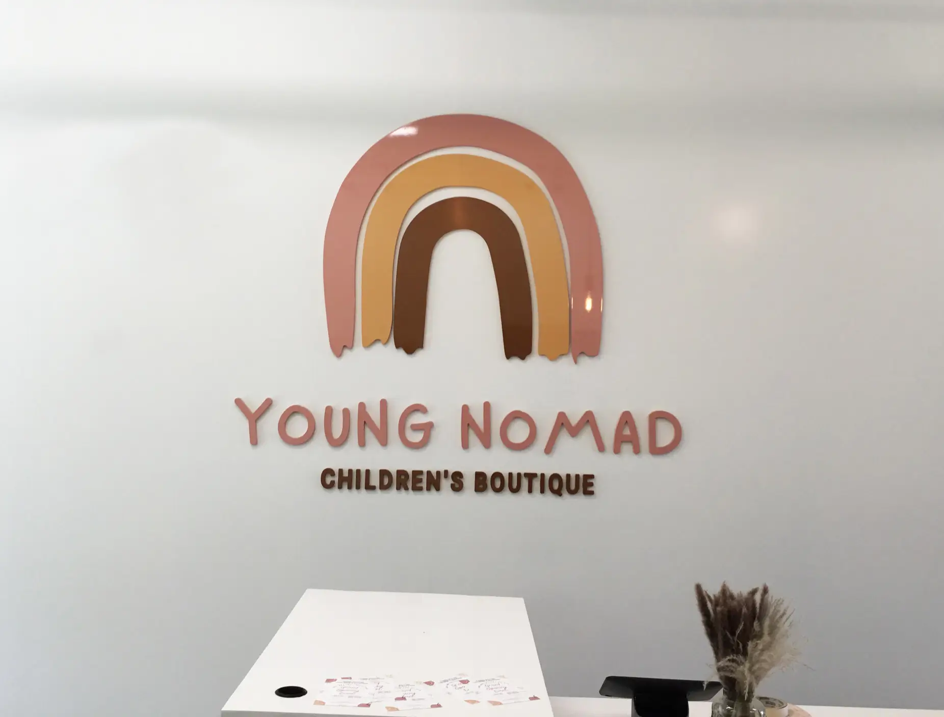 Young Nomad sign